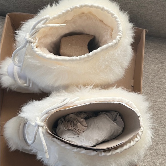 UGG® CLASSIC TALL CHALET BOOTS - Picture 7 of 11